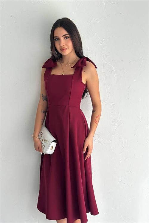 Neşeli butik kadın askılı fiyonk detaylı kloş elbise NBK4185