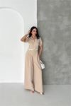 Neşeli butik kadın bej gömlek yaka kemerli geniş paça tulum NBK4197