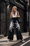 Neşeli butik kadın viskon kumaş bel fiyonk detaylı baskılı geniş paça pantolon NBHT05
